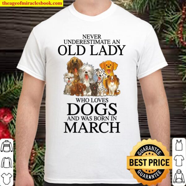 Never underestimate a March lady who loves dogs Shirt