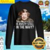 is rusty still in the navy sweater