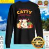 catty christmas a cat tangled in christmas lights with the quote we wish you a catty christmas t shi sweater