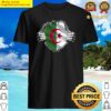 two hands ripping revealing flag of algeria shirt
